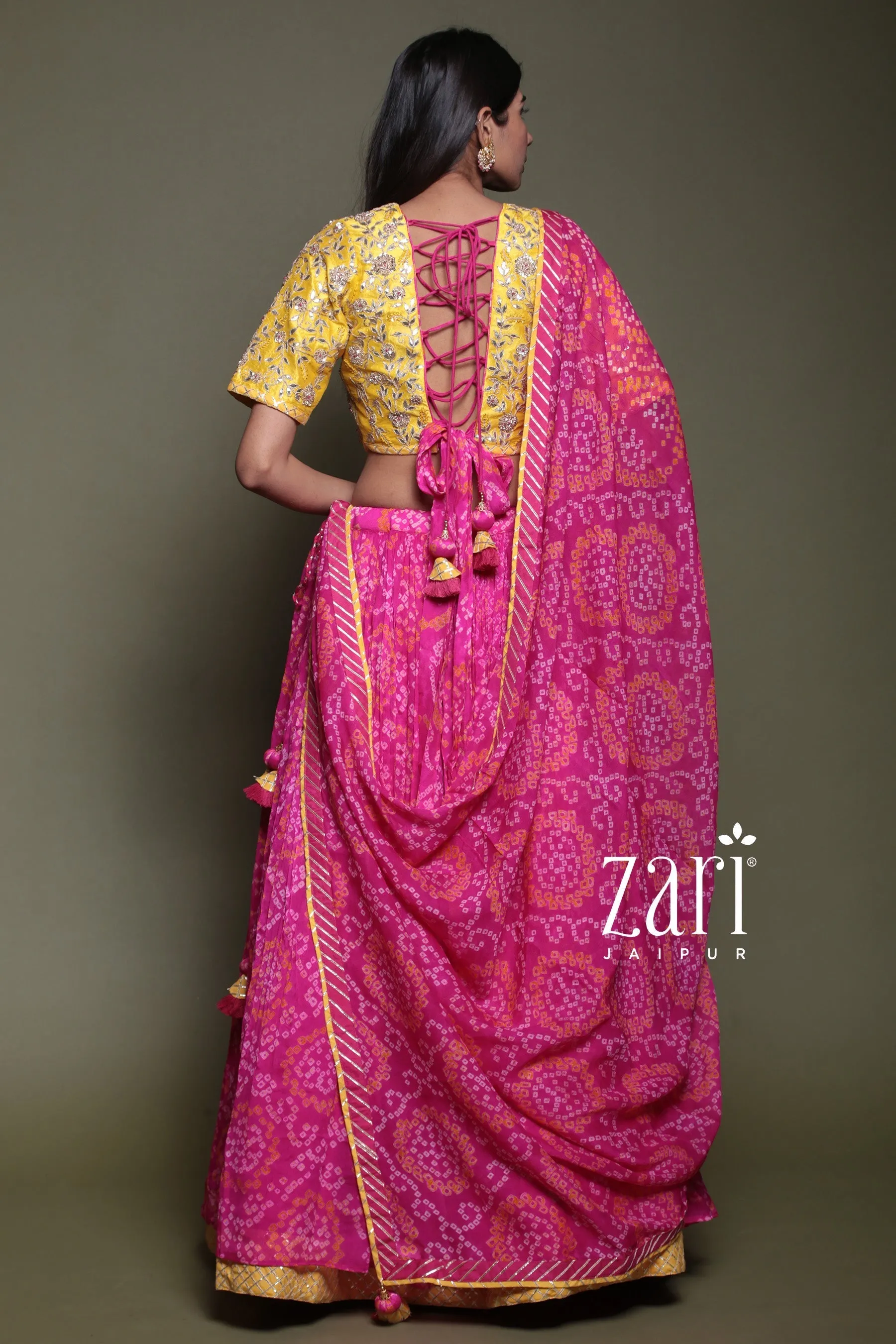 Bandhej Chinon silk Lehenga with Aari, Gota Patti, Sequins, Thread, Zardozi work.